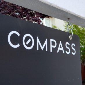 Compass Sues Zillow Over Listing Ban, Citing Antitrust Violations and Threat to Market Competition