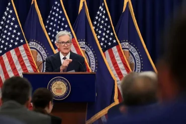 Fed Holds Rates Steady as Powell Signals Slower Cuts Amid Inflation and Global Unrest