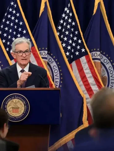 Fed Holds Rates Steady as Powell Signals Slower Cuts Amid Inflation and Global Unrest