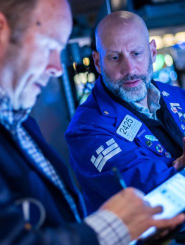 Treasury Yields Fluctuate as OECD Slashes U.S. Growth Forecast and Global Trade Tensions Mount